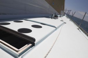 Close up of an open hatch on a yacht in the water.