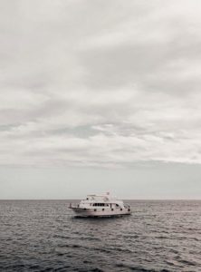 A family booking a luxury yacht in Cabo San Lucas.