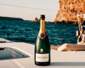 A bottle of champagne on a yacht