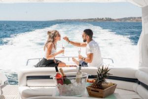 A couple having snacks at a yacht