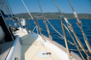 Beige and white yacht on the water