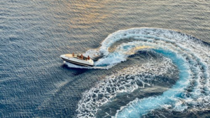people on a boat in the middle of the ocean