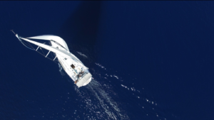 An aerial shot of a luxury yacht in Cabo San Lucas