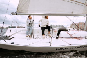 Men sitting on a white yacht
