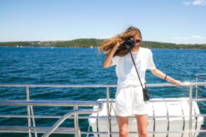 A woman enjoying herself on a yacht